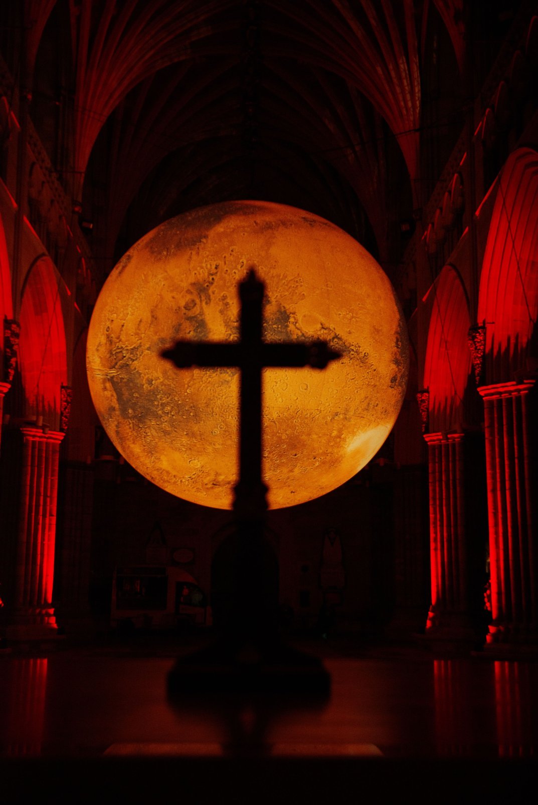 Mars in Exeter Cathedral with a shadow of a cross