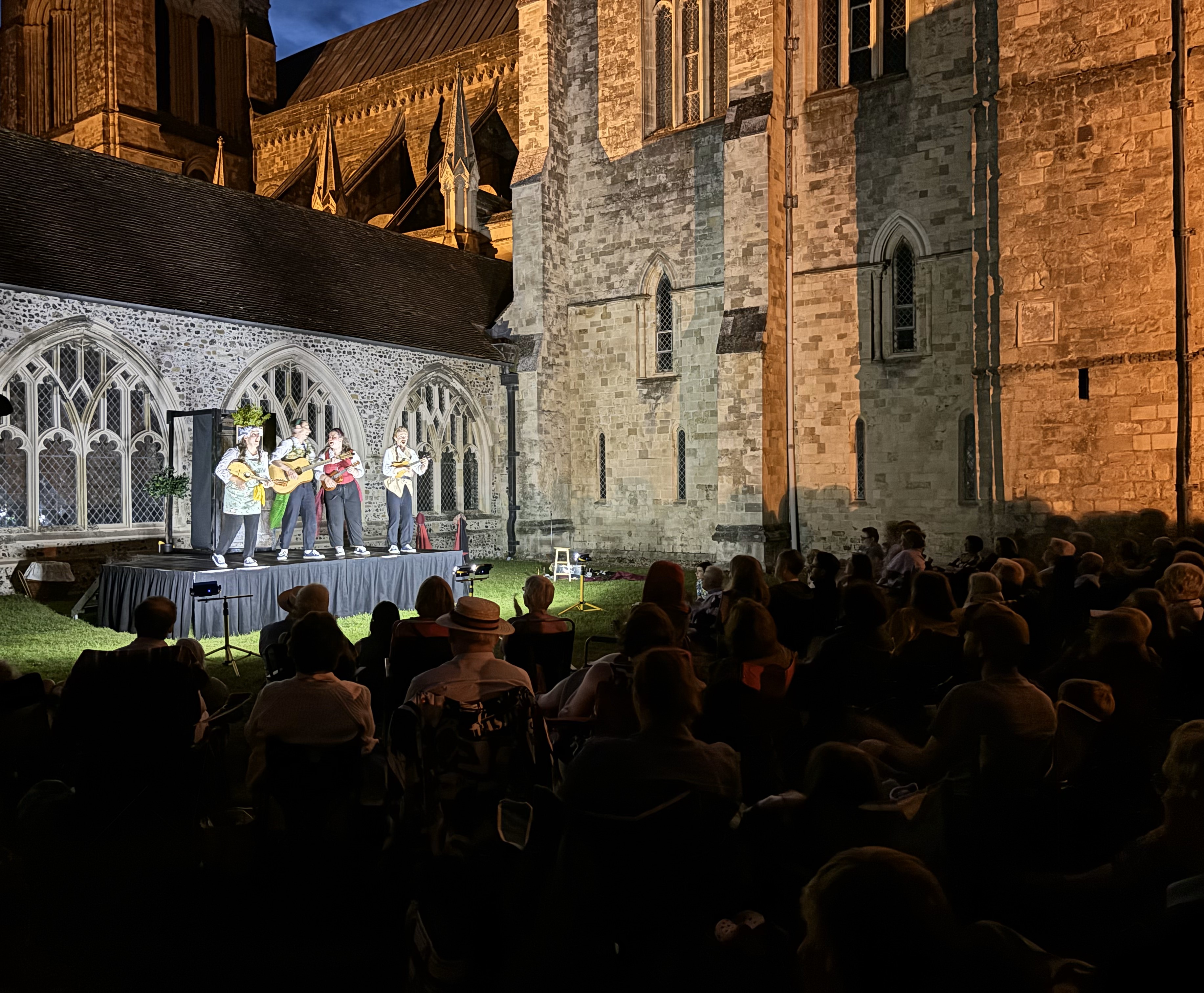 A theatre performance takes place in Paradise, the green space within the Cathedral cloisters.