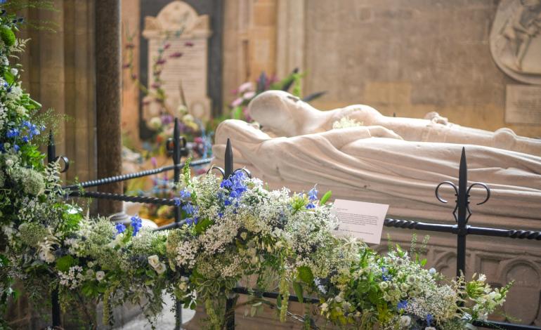 The Arundel Tomb with blue and white flowers