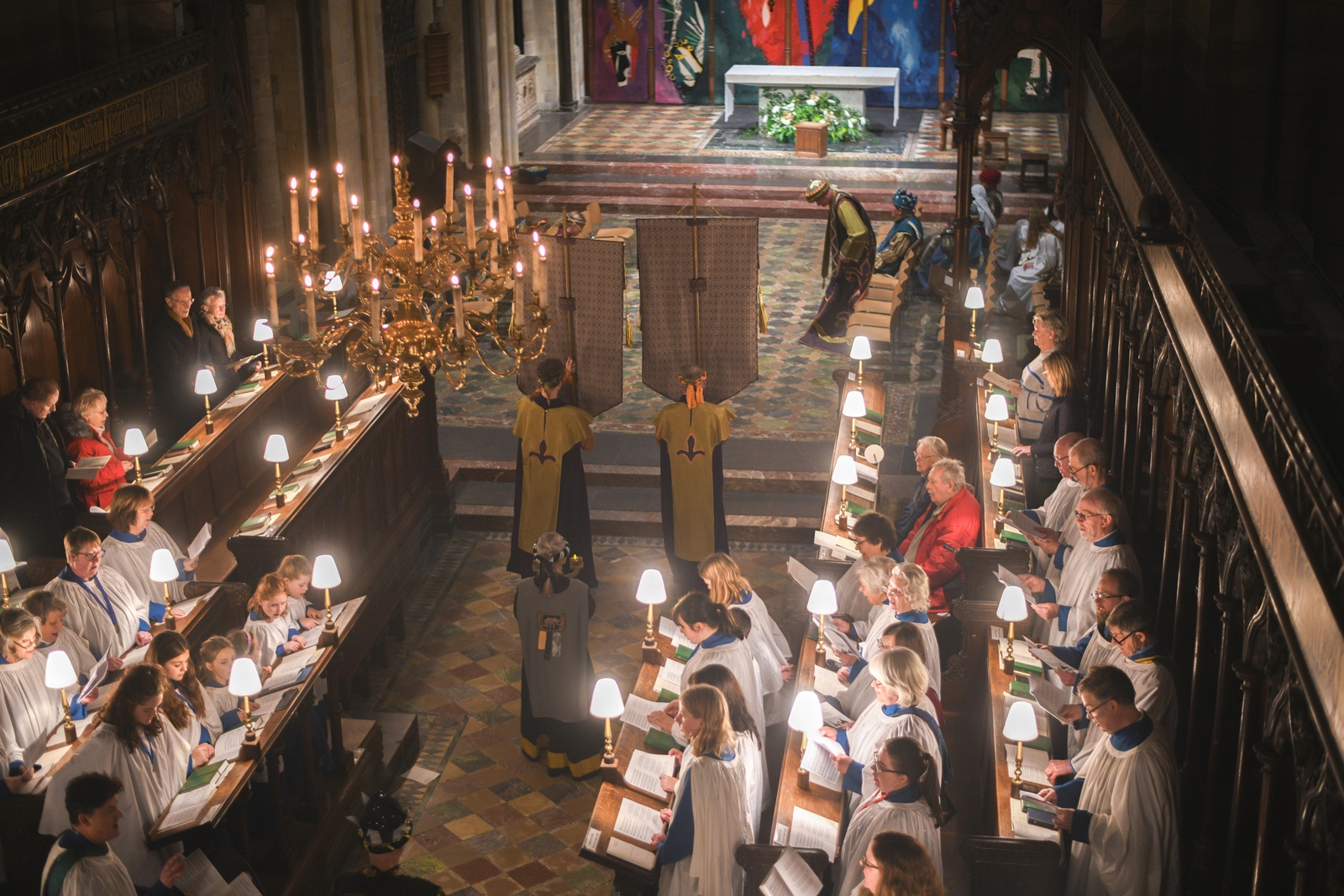 The procession walks through the Quire as the choir of St Paul's Church sing